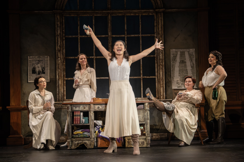 Joyce Meimei Zheng (center) as Ruza and the commpany of Suffs 📷 Joan Marcus
