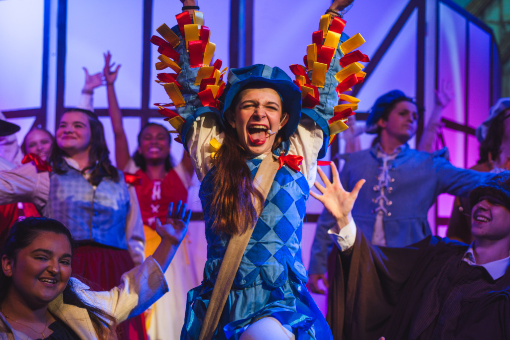 Mary Kate Bowden (center) as The Minstrel and the company of Something Rotten! at Theatreworks Live 📷Matthew Peterson