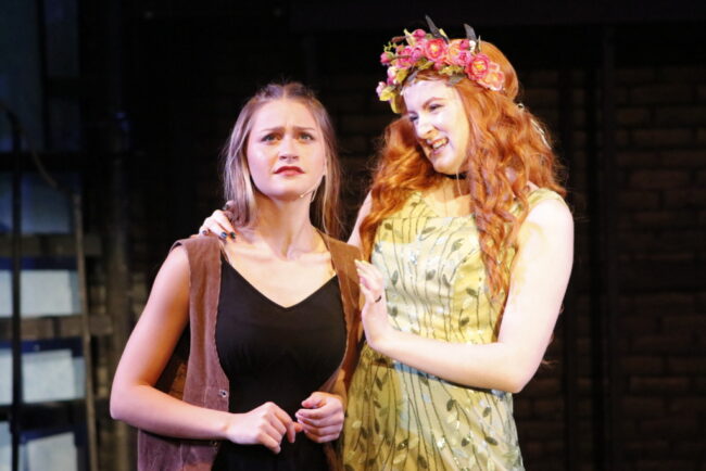 Lilah Fodel (left) as Eurydice and Catherine Ace Angelos (right) as Persephone in Hadestown (teen edition) at Children's Playhouse of Maryland 📷 Kelly Williams Carlson