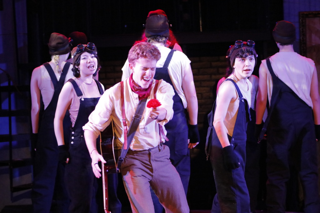 Max Ozbolt (center) as Orpheus and the cast of Hadestown (teen edition) at Children's Playhouse of Maryland 📷 Kelly Williams Carlson