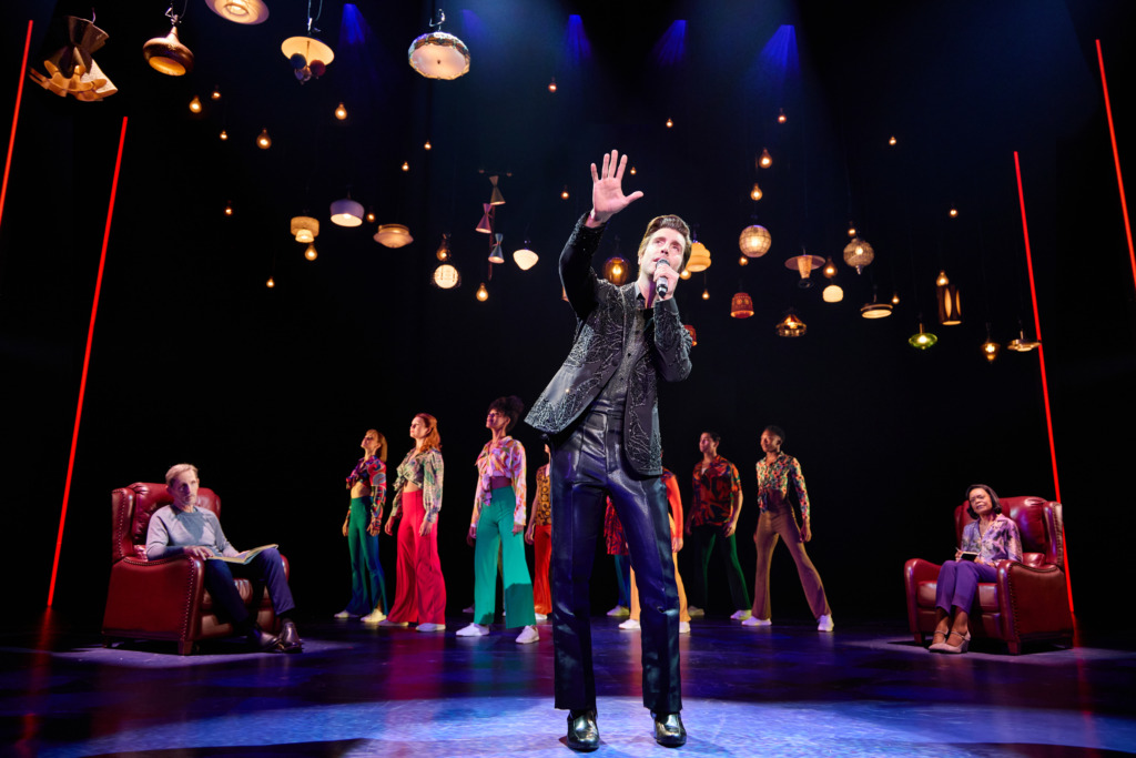 Nick Fradiani (center) as Neil 'Then' and the company of A Beautiful Noise: The Neil Diamond Musical 📷 Jeremy Daniel