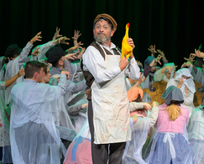 Todd Hochkeppel (center) as Lazar Wolf and the cast of Fiddler on the Roof at HCST đˇ Neil Rubino