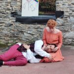 Steven Todd Smith (lapped) as Hotspur and Maureen O'Neal (holding) as Lady Percy in a micro-scene from Henry IV Part 1 at the opening ceremony for the 8th annual Frederick Shakespeare Festival. đˇ Mandy Gunther