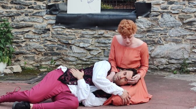 Steven Todd Smith (lapped) as Hotspur and Maureen O'Neal (holding) as Lady Percy in a micro-scene from Henry IV Part 1 at the opening ceremony for the 8th annual Frederick Shakespeare Festival. 📷 Mandy Gunther