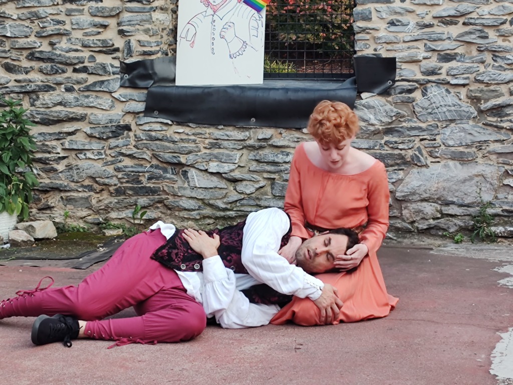 Steven Todd Smith (lapped) as Hotspur and Maureen O'Neal (holding) as Lady Percy in a micro-scene from Henry IV Part 1 at the opening ceremony for the 8th annual Frederick Shakespeare Festival. 📷 Mandy Gunther