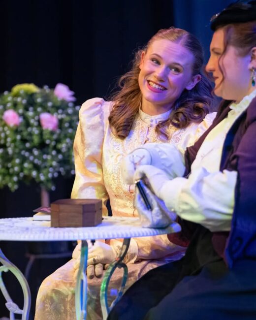 Emma Justine Roeder (left) as Cecily and Elena Echeandia (right) as Gwendolen in The Importance of Being Earnest at ESP Theatre đˇ Michael Mason Studios
