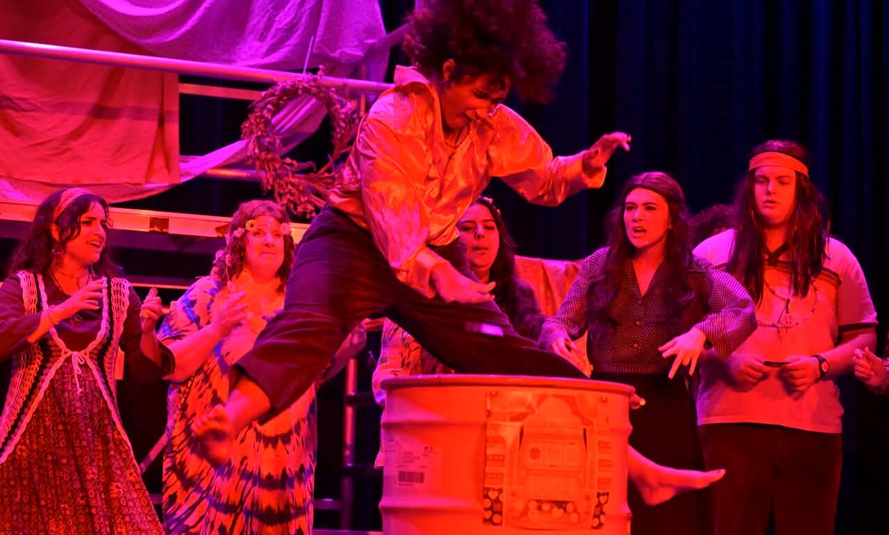 Chiamaka Nwokeji (center) as Berger and the Tribe of Hair at Small Town Stars Theatre Company 📷 Mort Shuman