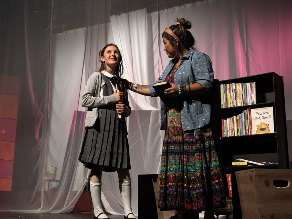 Mary Fliehman (left) as Matilda and Patricia Anderson (right) as Mrs. Phelps in Matilda at Silhouette Stages đˇ Shealyn Jae Photography